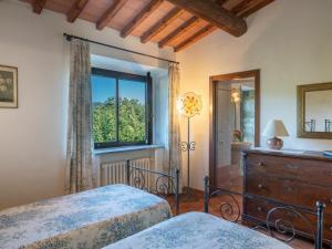 Posteľ alebo postele v izbe v ubytovaní Holiday Home La Badia by Interhome