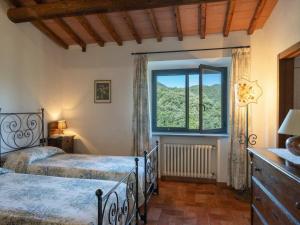 Posteľ alebo postele v izbe v ubytovaní Holiday Home La Badia by Interhome
