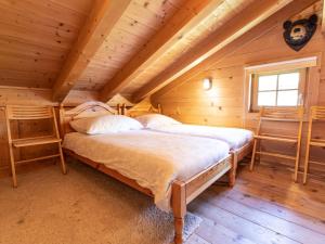 Katil atau katil-katil dalam bilik di Chalet Königsleiten 2 by Interhome +23 gambar