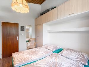 Postel nebo postele na pokoji v ubytování Apartment Haus Point-1 by Interhome