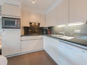 Kuchyň nebo kuchyňský kout v ubytování Apartment Sea Breeze by Interhome