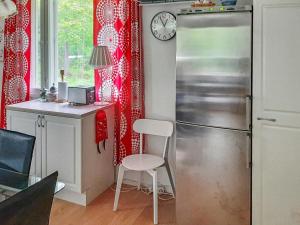 Kuchyň nebo kuchyňský kout v ubytování Holiday Home Huvikumpu by Interhome