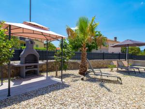 Ogród w obiekcie Holiday Home Villa Palma by Interhome