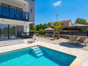 Basen w obiekcie Holiday Home Villa Palma by Interhome lub w pobliżu