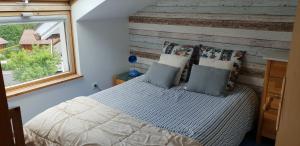 Postel nebo postele na pokoji v ubytování Gîte spacieux et lumineux proche centre ville