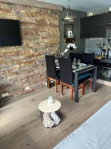 Kuchnia lub aneks kuchenny w obiekcie Appt 123 Home Club Tignes