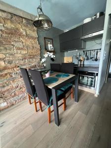 Kuchnia lub aneks kuchenny w obiekcie Appt 123 Home Club Tignes