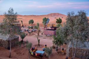 a village in the middle of the desert at Ali & Sara's Desert Palace in Merzouga