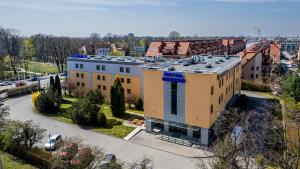 an aerial view of a building in a city at Premium Hotel Bacero Wrocław in Wrocław