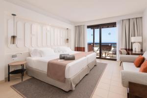 Voodi või voodid majutusasutuse Barceló Tenerife Royal Level toas
