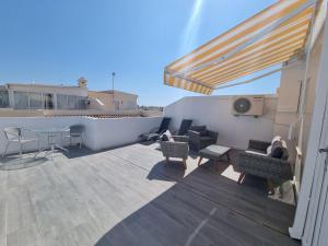 A balcony or terrace at 3 Bedroom Apartment Playa Flamenca La Zenia
