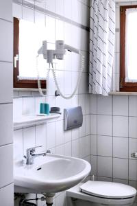 Koupelna v ubytování Hotel Im Kräutergarten
