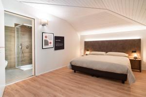 Ein Bett oder Betten in einem Zimmer der Unterkunft Relais Lucomagno