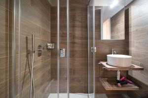 Ein Badezimmer in der Unterkunft Relais Lucomagno