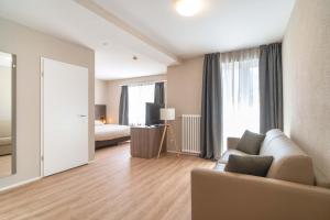 Postel nebo postele na pokoji v ubytování Relais Lucomagno