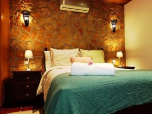 Tempat tidur dalam kamar di Quinta do Vale Encantado