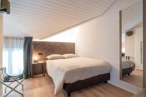 Ein Bett oder Betten in einem Zimmer der Unterkunft Relais Lucomagno