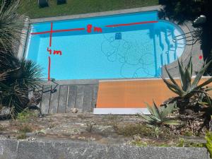 a view of a swimming pool with a diagram on it at Casa Ariane in Ronco s/Ascona - Porto Ronco