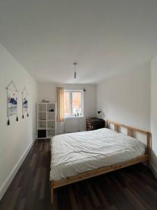Ένα ή περισσότερα κρεβάτια σε δωμάτιο στο Modern Apartment in Dundee City Centre