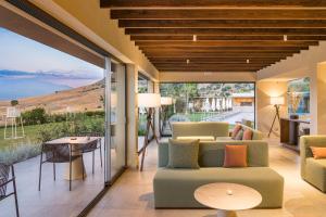 a living room with a couch and a table at Rocca dei Saraceni in Regalbuto