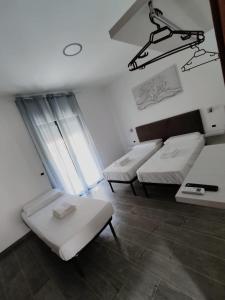 Postel nebo postele na pokoji v ubytování B&B Aurora