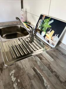Kuchyňa alebo kuchynka v ubytovaní Apartman Tunja