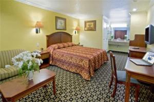 Ένα ή περισσότερα κρεβάτια σε δωμάτιο στο Americas Best Value Inn San Bernardino