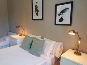 Katil atau katil-katil dalam bilik di Menina da Ria Guest House
