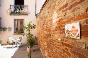 Posezení v ubytování Il Libro- Family Holiday in Tuscany