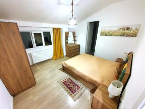 Ένα ή περισσότερα κρεβάτια σε δωμάτιο στο Villa On The River