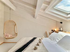 a bedroom with a large bed and a window at Santa Lucia Maccarese - Residenza Agricola in Maccarese