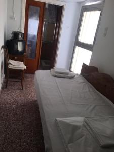 Fotografia z galérie ubytovania NICK APARTMENTS OKEANIS SYROS v destinácii Ermoupoli