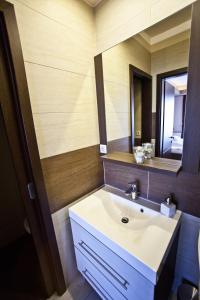 A bathroom at Németh Apartmanok