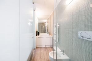 A bathroom at Amazing flat in Duomo by Easylife