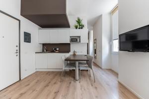 A kitchen or kitchenette at Amazing flat in Duomo by Easylife