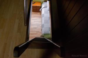 a view of a hallway from inside a room at Hotel Saueth in Tredós