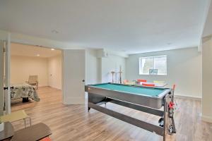 a living room with a pool table in it at Spacious and Modern Ashley Falls Home on 1 Acre 
