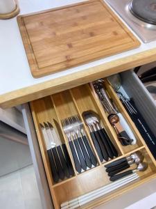 a drawer filled with utensils in a kitchen at Ocean View. Acogedor Apartamento frente al mar in Porlamar