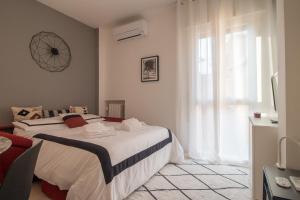 Posteľ alebo postele v izbe v ubytovaní Grey House in the heart of @Treviso