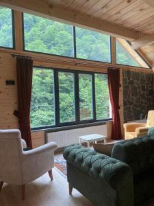 A seating area at AYDER LEVUT Bungalov