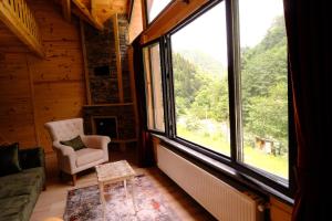 A seating area at AYDER LEVUT Bungalov