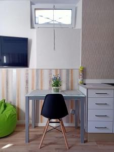TV a/nebo společenská místnost v ubytování Ángeles home