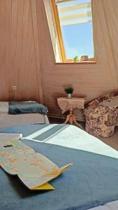 Ein Bett oder Betten in einem Zimmer der Unterkunft Willa Juna Tatry