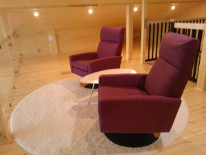 Posezení v ubytování Mustikkakallio Luxury Villa
