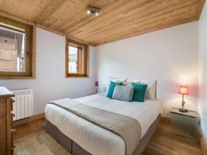 Un ou plusieurs lits dans un hébergement de l'établissement Appartement Val-d'Isère, 5 pièces, 8 personnes - FR-1-567-29