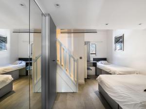 Appartement Val-d'Isère, 4 pièces, 8 personnes - FR-1-567-9 tesisinde bir odada yatak veya yataklar