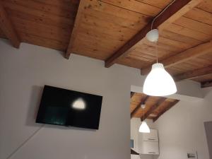 TV a/nebo společenská místnost v ubytování CORFU OASIS studio