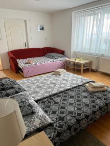 Postel nebo postele na pokoji v ubytování Celý dům v historickém centru Loun