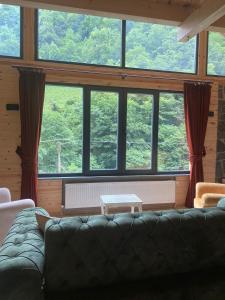 A seating area at AYDER LEVUT Bungalov