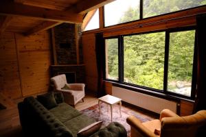 A seating area at AYDER LEVUT Bungalov
